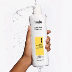 Sistema 1 - Acondicionador - Cabello Natural con Debilitamiento Leve 300 ml - Nioxin